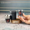 شات استیل 4 عددی مشکی در دست
