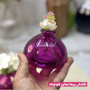گلدان بلور‌ رنگی ریما سایز کوچک در دست برای تفهیم سایز محصول