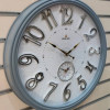 رنگ طوسی ساعت دیواری رولکس سایز ۶۰ سانتی‌متر از نمای کناری به نمایش در آمده است