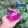 سایز کوچک از گلدان رنگی مدل ریما در دست.
