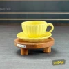 رنگ لیمویی از فنجان صدفی بهمراه رایزر.