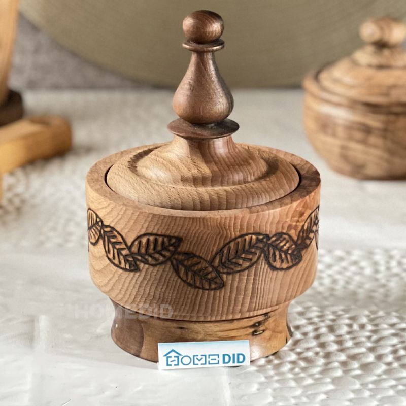 long wooden sugar bowl with patterned body made of beech wood