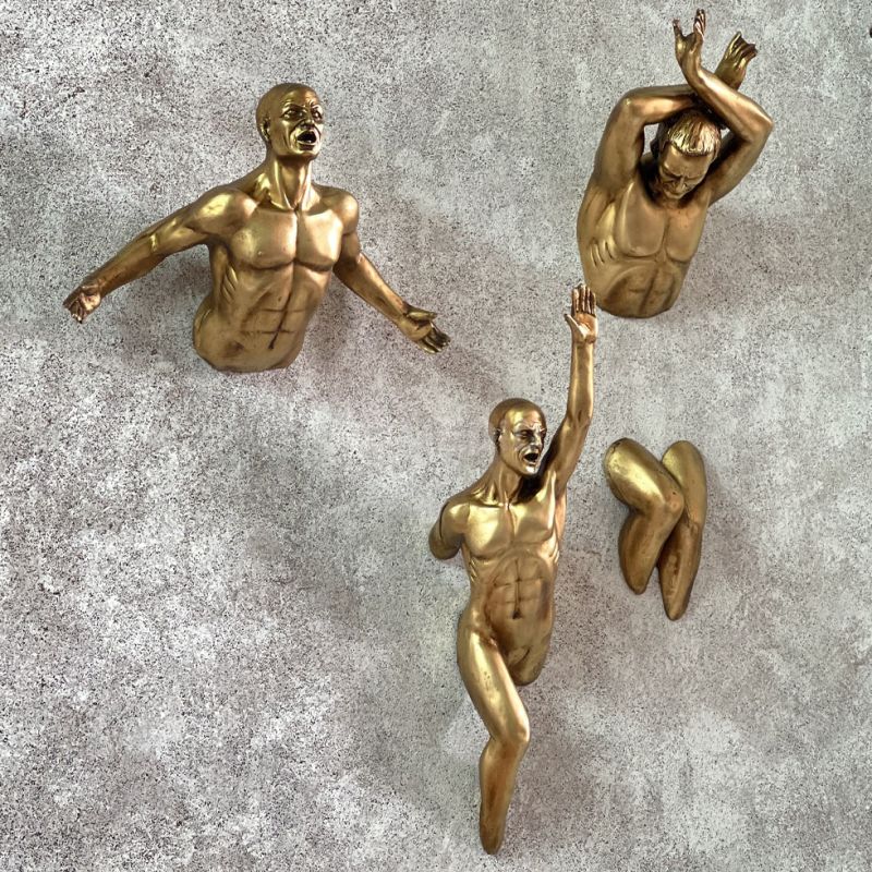 wall sculpture of a human figure a set of 3 members