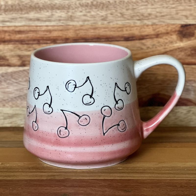 Imported ceramic mug with white-pink cherry design