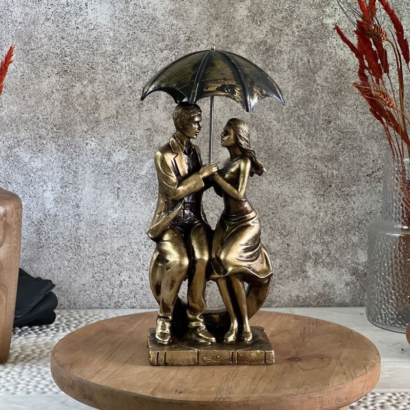 man and a woman in love under an umbrella